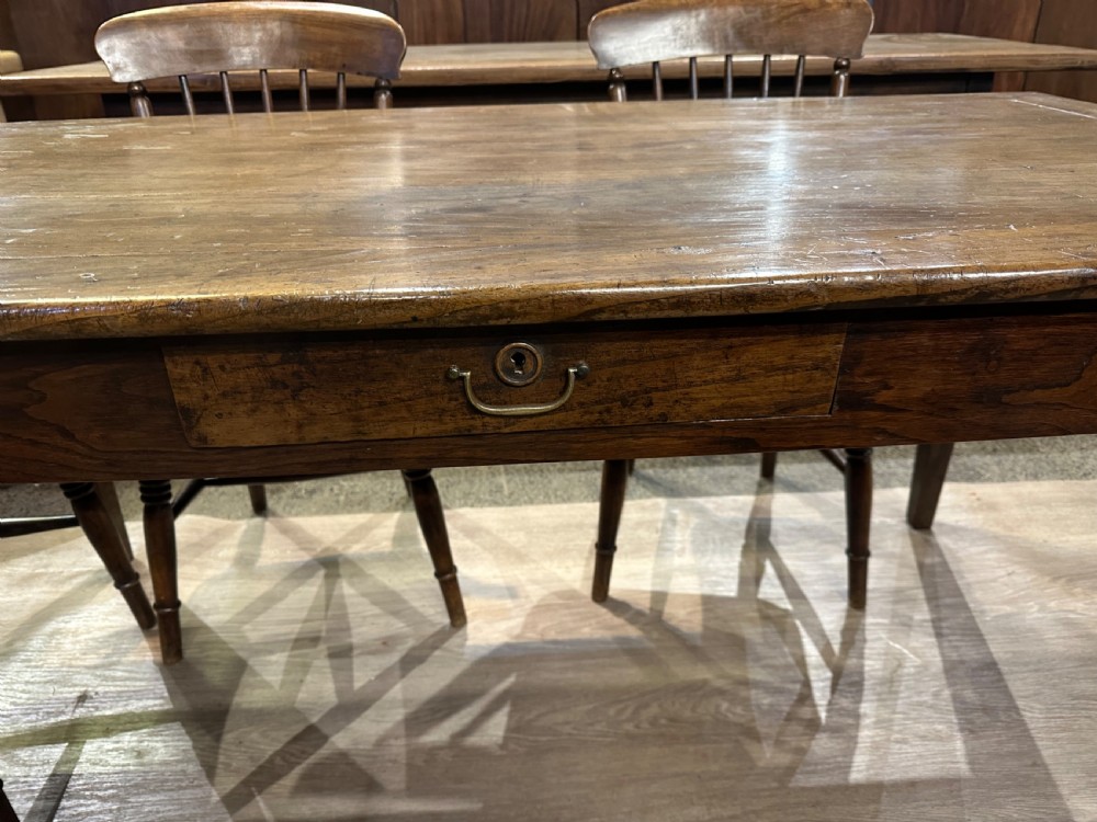 A 19th-century rectangular chestnut farmhouse table featuring a framed timber top, a single central frieze drawer, and four tapered square legs. View III