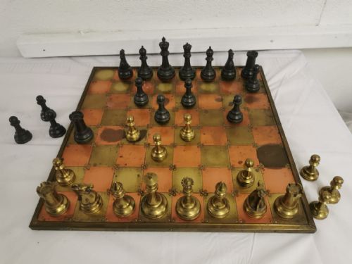 a unusual art's and crafts chess set and board - CATEGORY: ANTIQUE MISCELLANEOUS - DATED 1910