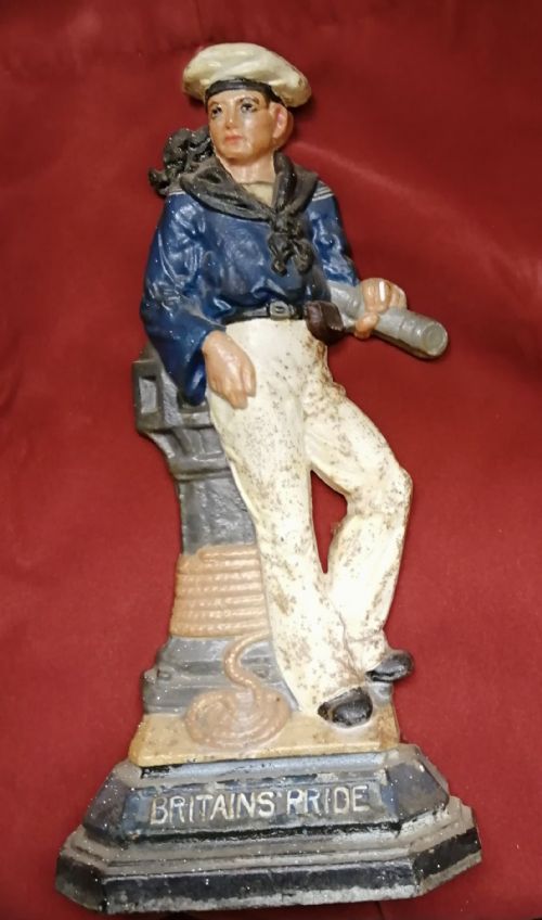 antique door stop britain's pride metal figure - CATEGORY: ANTIQUE MISCELLANEOUS - DATED 1910