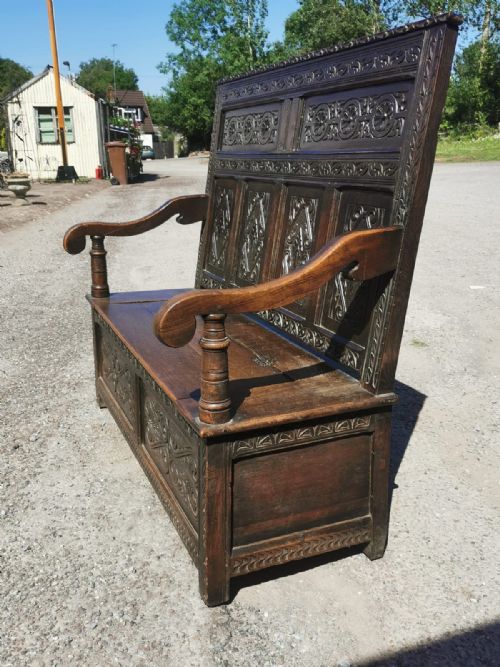 ANTIQUE CARVED OAK SETTLE BENCH - ADDITIONAL PHOTO 1