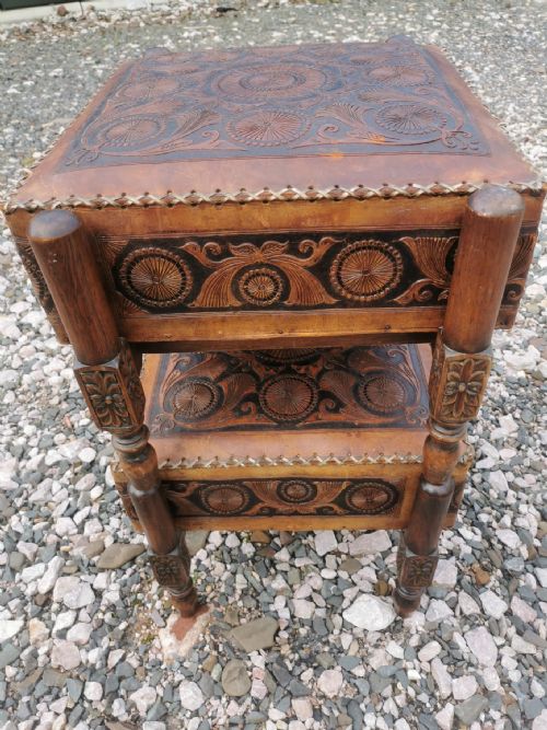A LARGE PAIR OF ANTIQUE EASTERN EMBOSSED AND DECORATED LEATHER AND WALNUT FRAMED STOOLS - ADDITIONAL PHOTO 5