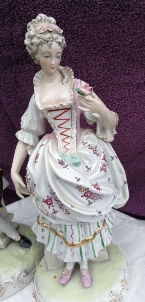 AN ANTIQUE PAIR OF LARGE CONTINENTAL PORCELAIN FIGURINES - ADDITIONAL PHOTO 1