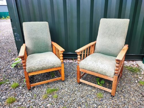 A PAIR OF ART'S AND CRAFTS LIGHT OAK UPHOLSTERED ARMCHAIRS - ADDITIONAL PHOTO 1
