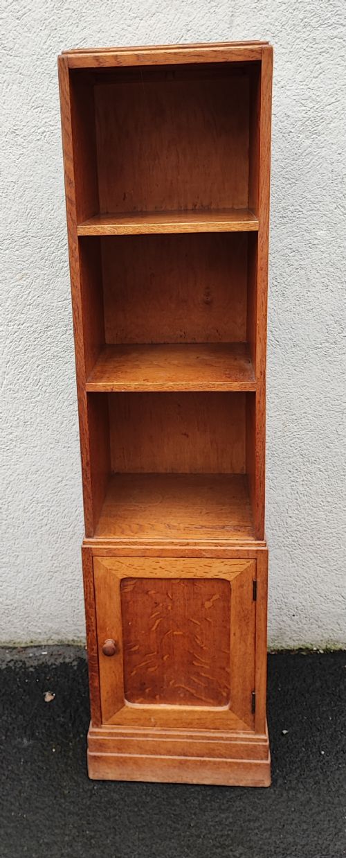a slim oak open bookcase by heals of london - CATEGORY: ANTIQUE BOOKCASES - DATED 1930
