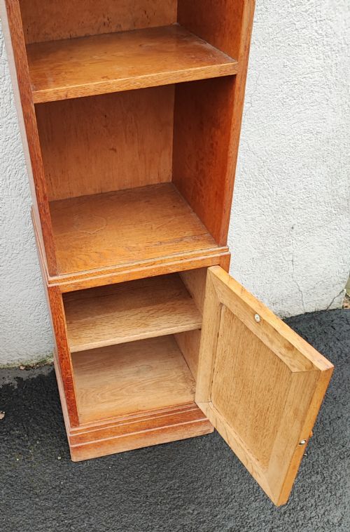 A SLIM OAK OPEN BOOKCASE BY HEALS OF LONDON - ADDITIONAL PHOTO 1