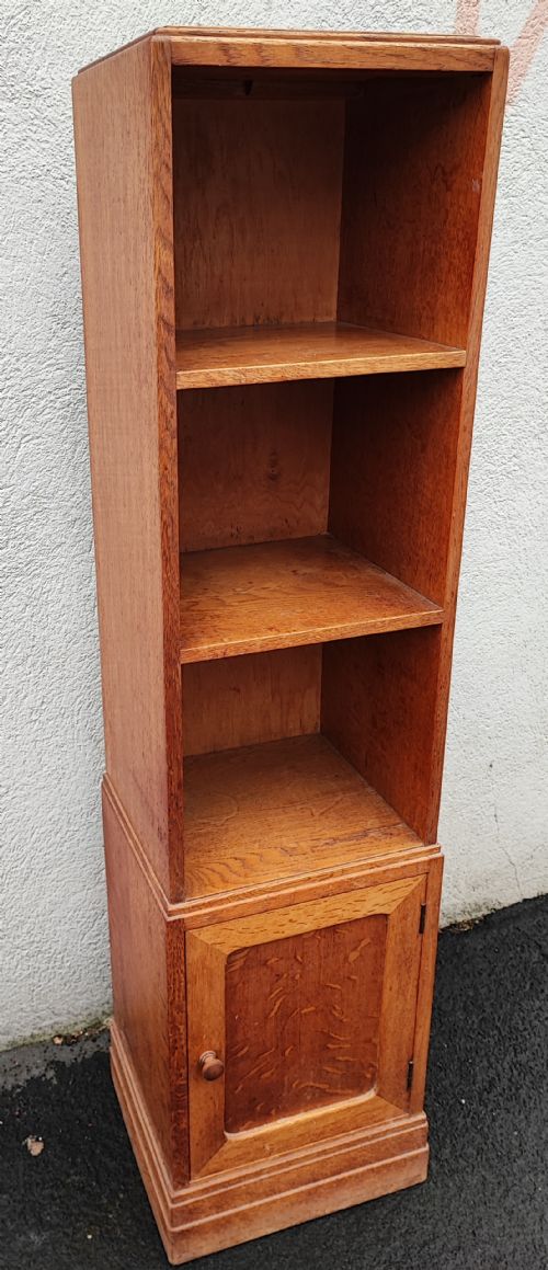 A SLIM OAK OPEN BOOKCASE BY HEALS OF LONDON - ADDITIONAL PHOTO 4