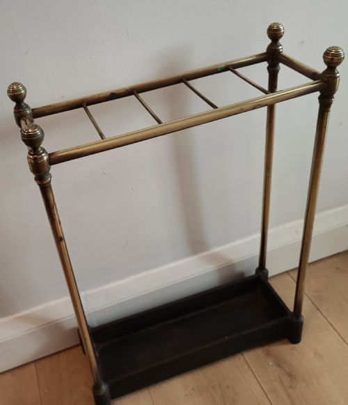 a 19c narrow 5 division brass and cast iron umbrella stand - CATEGORY: ANTIQUE MISCELLANEOUS - DATED 19TH CENTURY