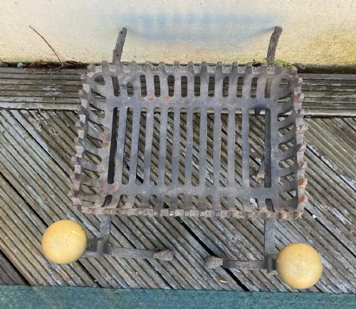 AN ANTIQUE CAST IRON AND BRASS FIRE BASKET - ADDITIONAL PHOTO 1