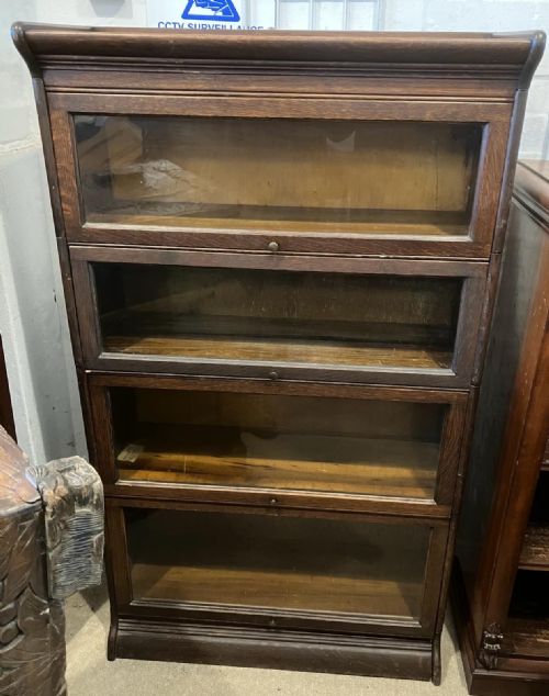 an edwardian oak 4 section stacking bookcase - CATEGORY: ANTIQUE BOOKCASES - DATED EDWARDIAN