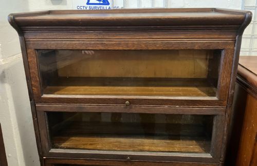 AN EDWARDIAN OAK 4 SECTION STACKING BOOKCASE - ADDITIONAL PHOTO 1