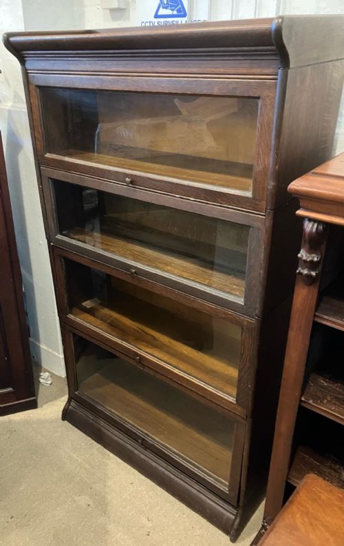AN EDWARDIAN OAK 4 SECTION STACKING BOOKCASE - ADDITIONAL PHOTO 4