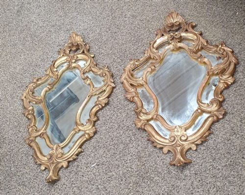 an antique pair of italian carved giltwood mirrors - CATEGORY: ANTIQUE MIRRORS - DATED 1920