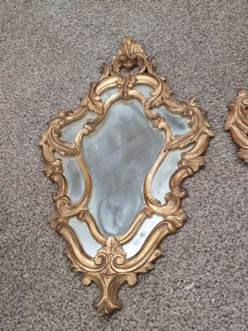 AN ANTIQUE PAIR OF ITALIAN CARVED GILTWOOD MIRRORS - ADDITIONAL PHOTO 2