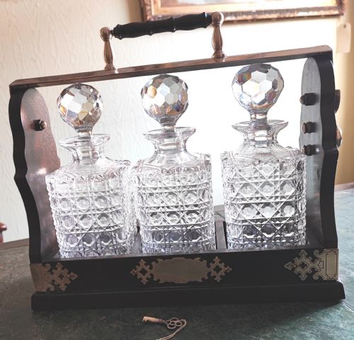 AN ANTIQUE MAHOGANY AND CUT GLASS TANTALUS - ADDITIONAL PHOTO 1