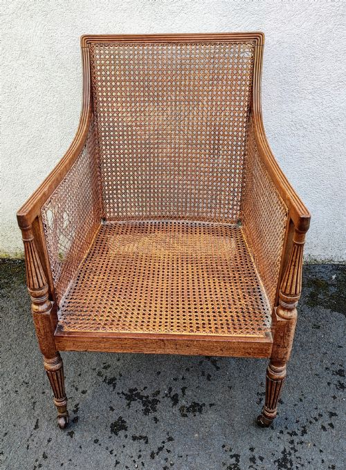 a regency gillows mahogany bergere library arm chair - CATEGORY: ANTIQUE CHAIRS - DATED REGENCY