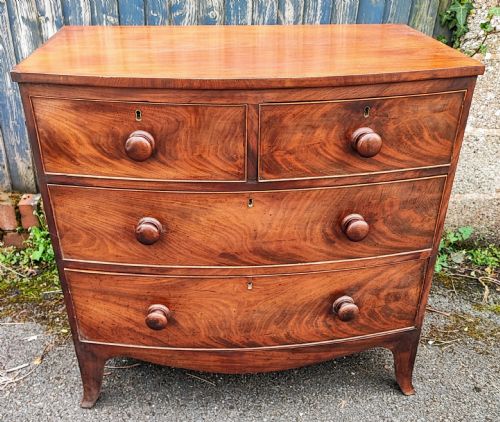 a small regency mahogany bowfront chest of drawers - CATEGORY: ANTIQUE CHEST OF DRAWERS - DATED REGENCY