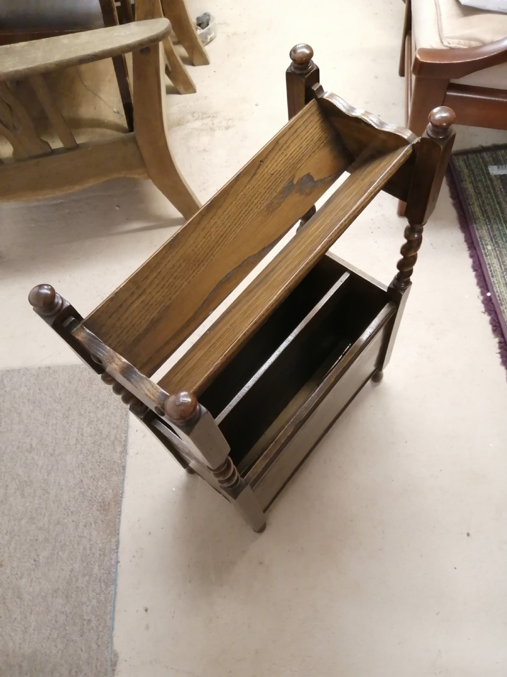 1920s book trough and magazine rack.