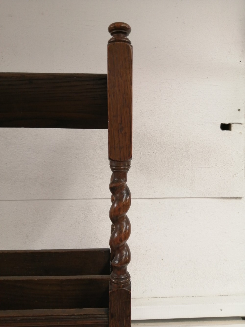 1920s book trough and magazine rack. View III