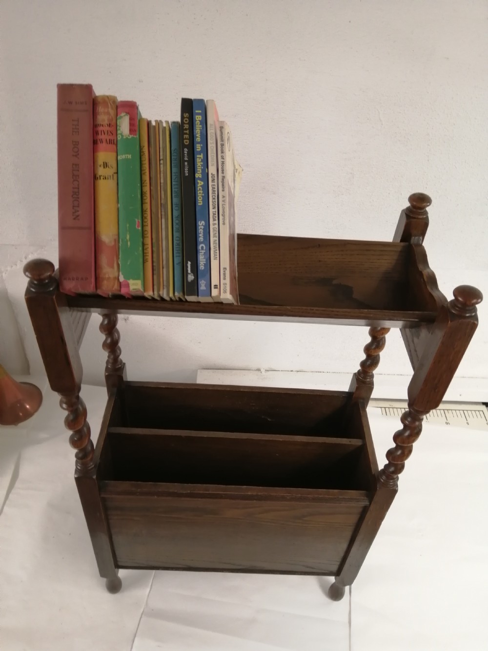 1920s book trough and magazine rack. View V