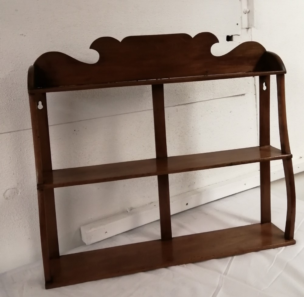 19c light mahogany ,hanging shelf .