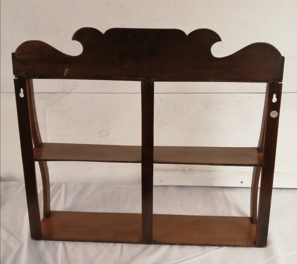19c light mahogany ,hanging shelf . View VII