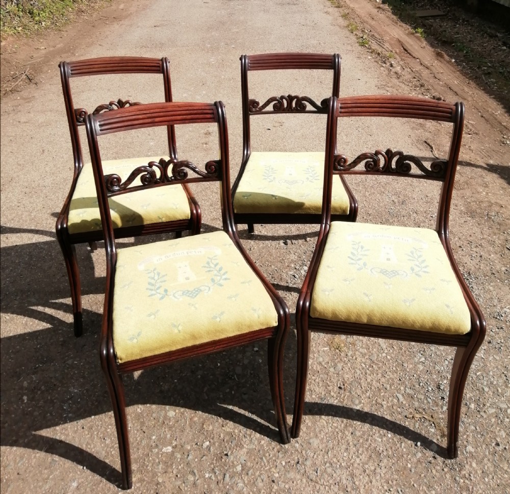 4 Regency chairs with fine needlework heraldic seats.