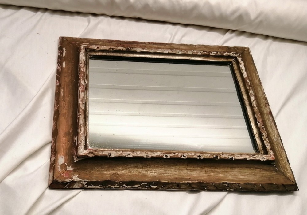 Antique French gilded wall mirror.