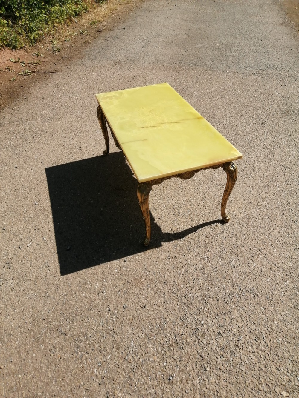 French brass and Onyx coffee table. View IV