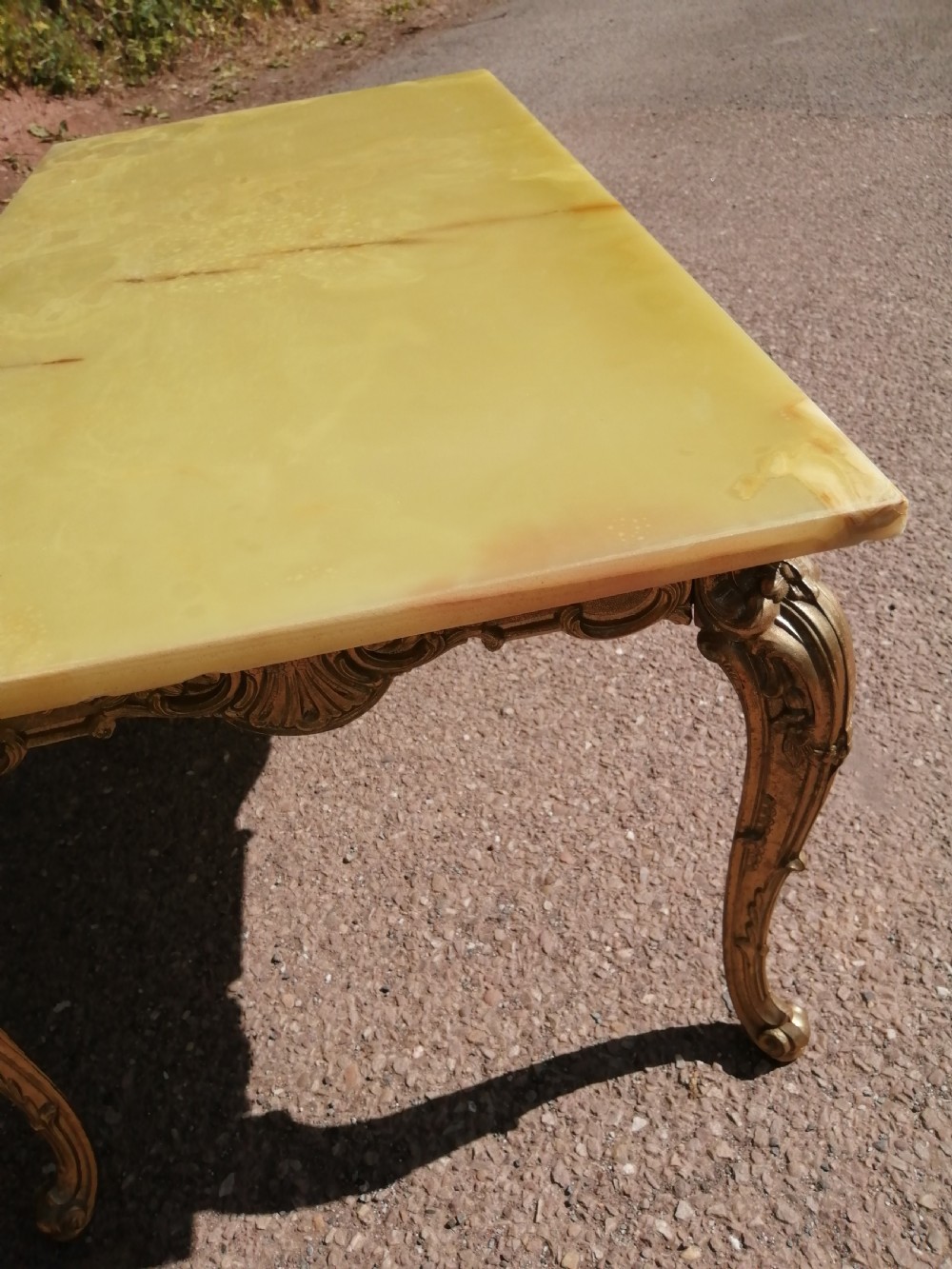 French brass and Onyx coffee table. View VI