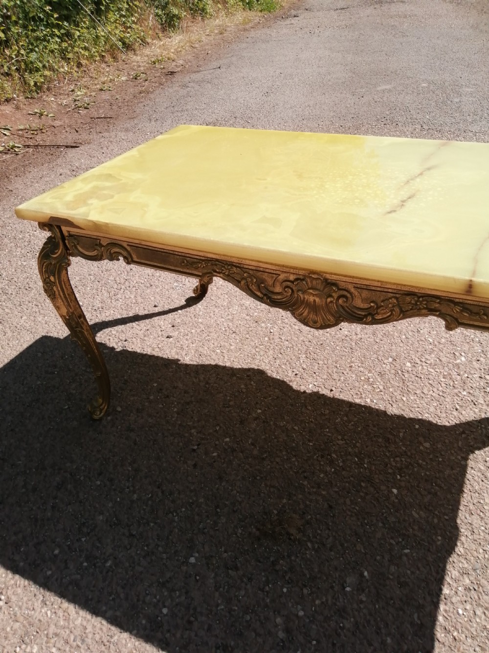 French brass and Onyx coffee table. View VII