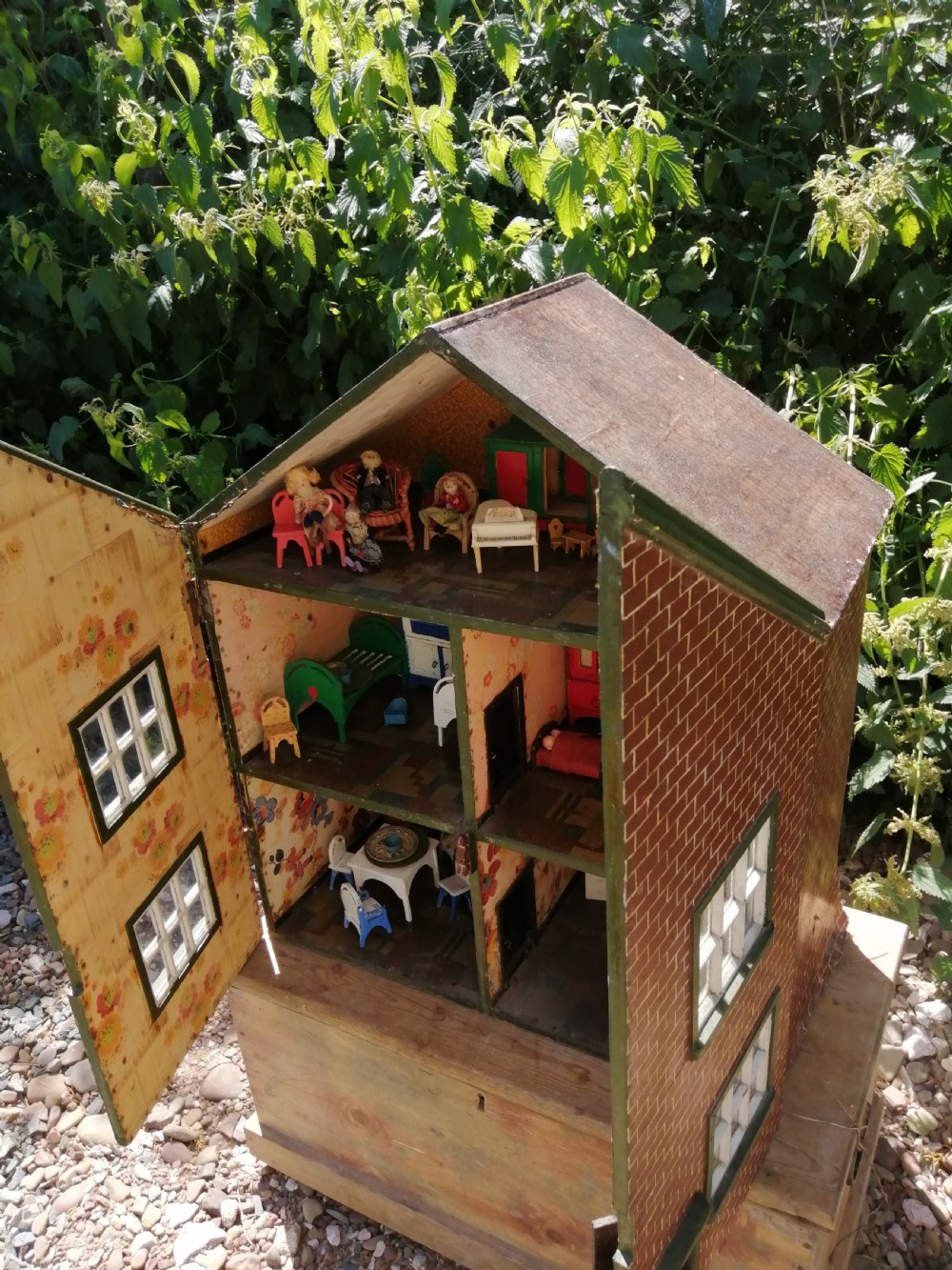 Antique Dolls house and contents.