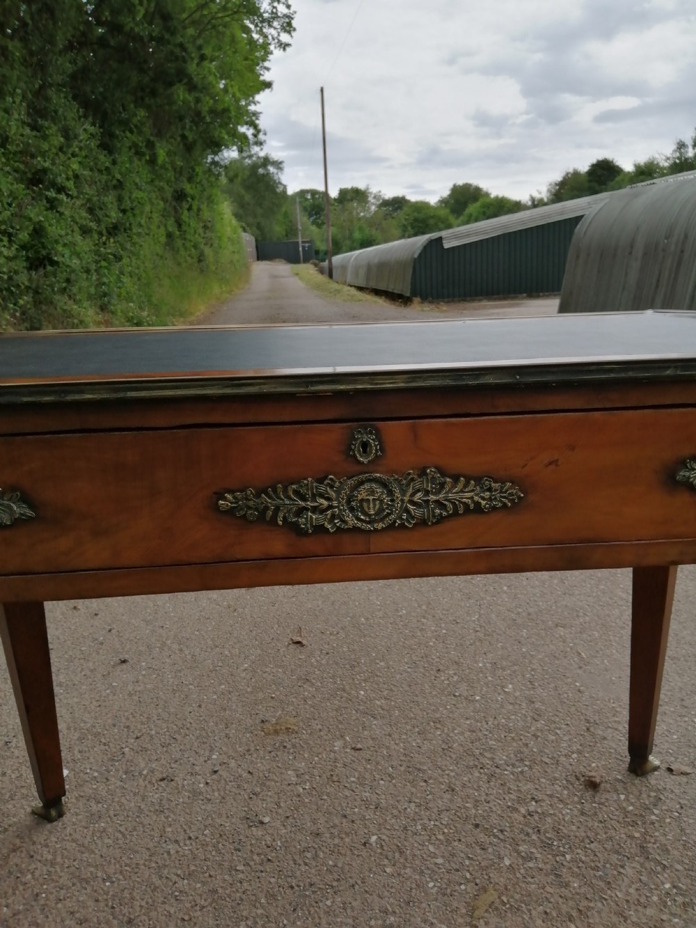 Antique French walnut writing table. View XVI
