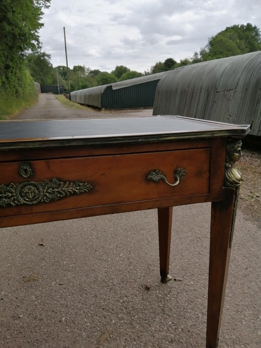 Antique French walnut writing table. View XVII