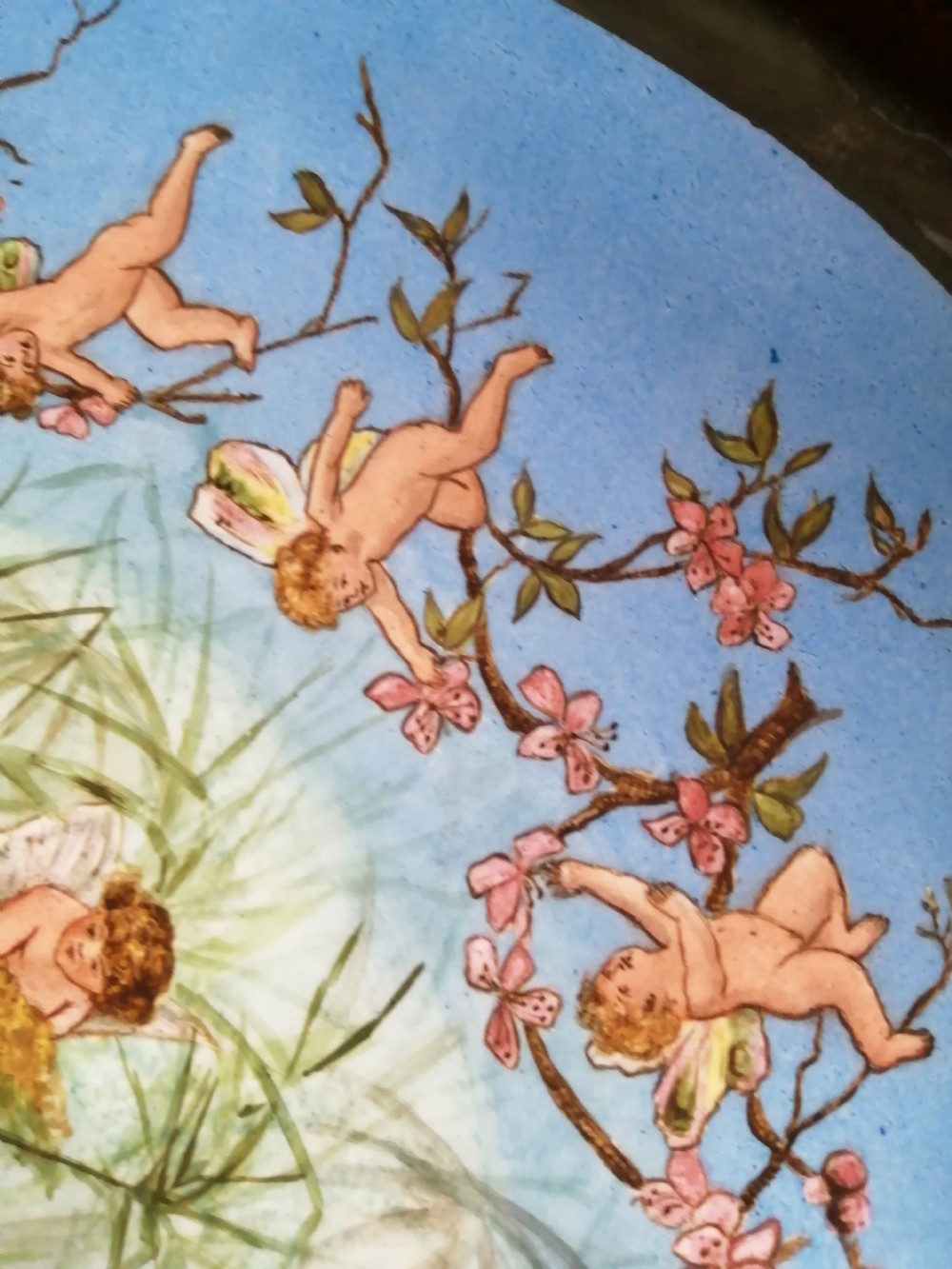 Victorian pottery charger depicts cherubs at play  View IV