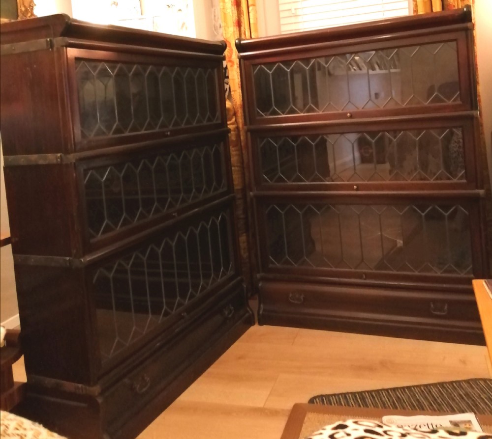 A pair of Edwardian mahogany Globe Wernicke's. 