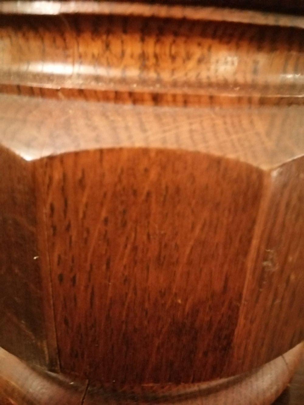An antique oak biscuit barrel. View II