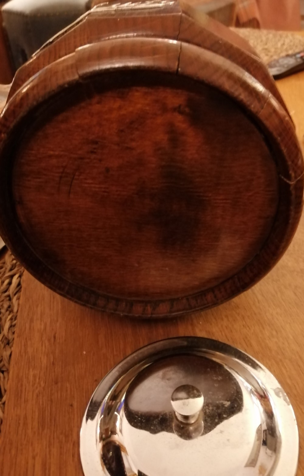 An antique oak biscuit barrel. View III