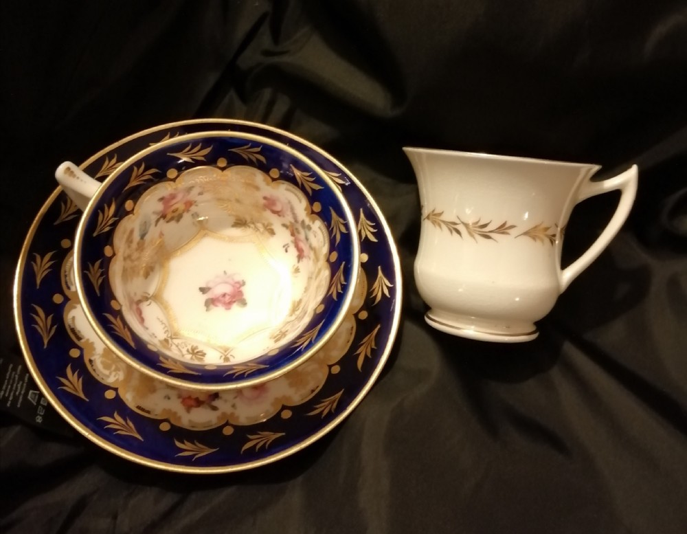 Antique cabinet set 2 cups 1 saucer.  View III