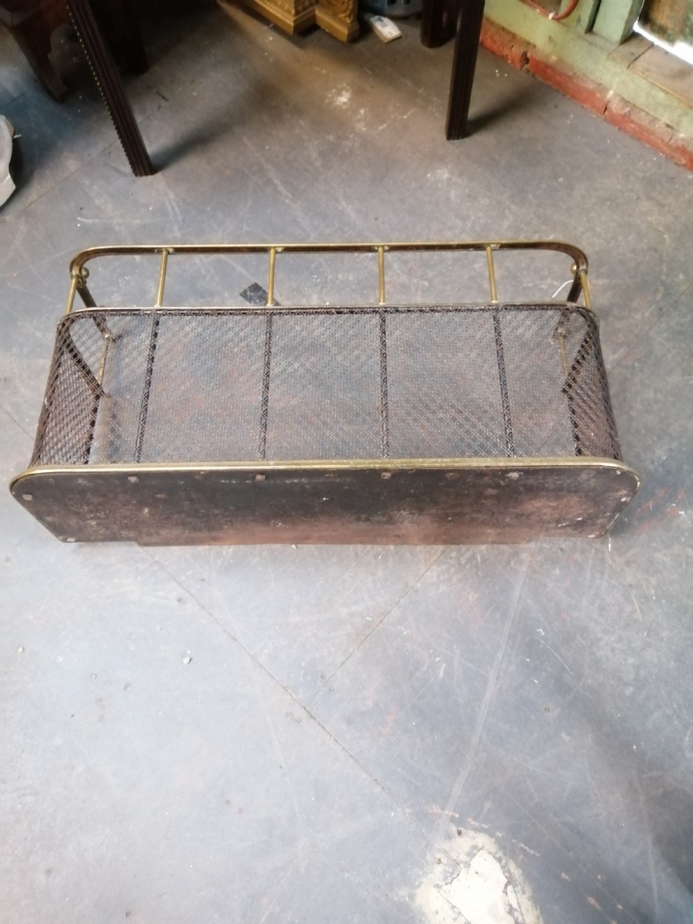 An attractive brass and mesh spark fender. View II