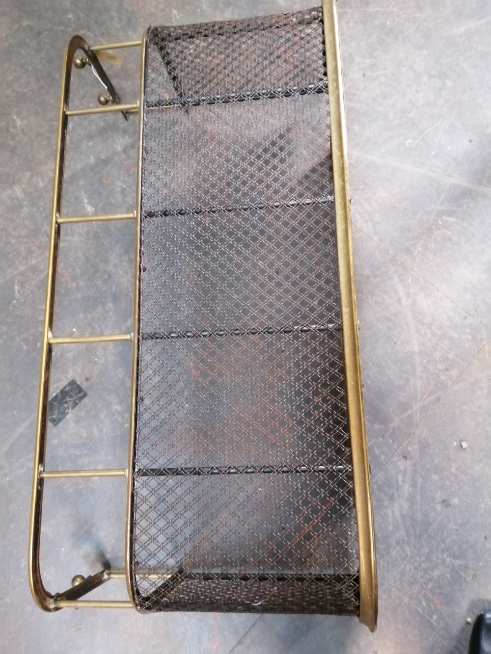 An attractive brass and mesh spark fender. View III