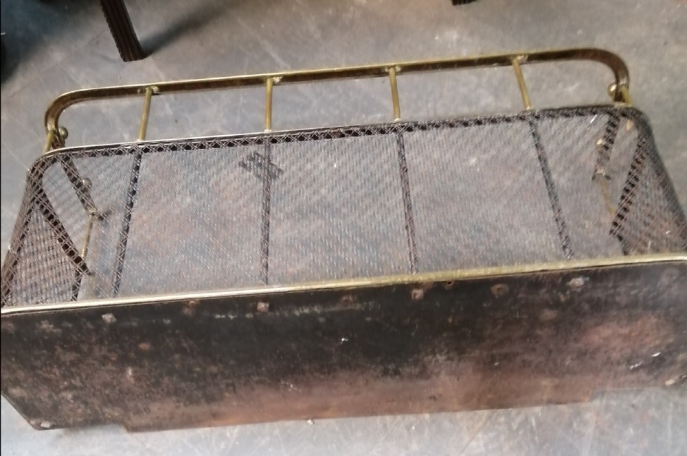 An attractive brass and mesh spark fender. View V