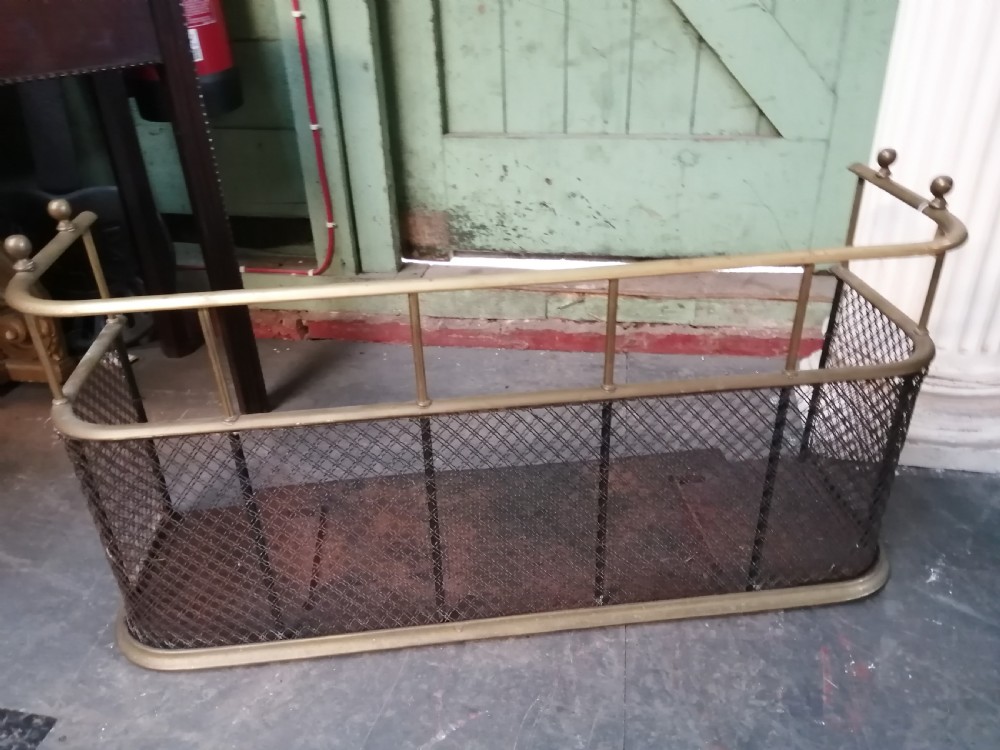 An attractive brass and mesh spark fender. View VII