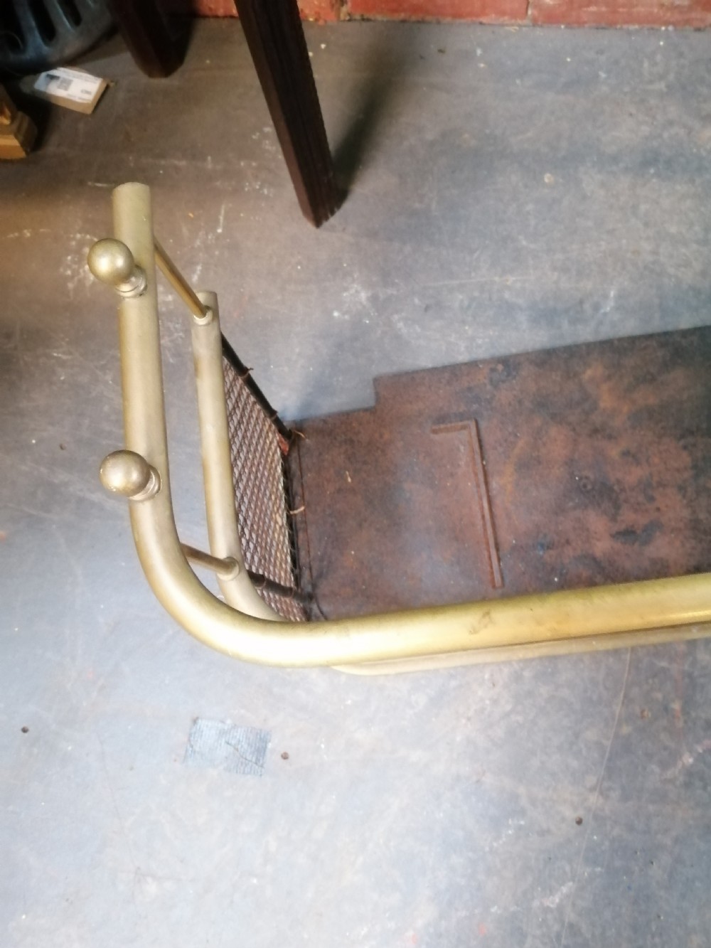 An attractive brass and mesh spark fender. View X