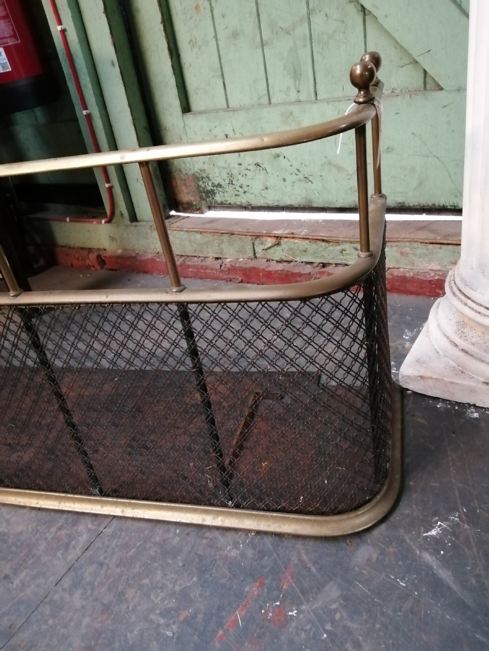 An attractive brass and mesh spark fender. View XI