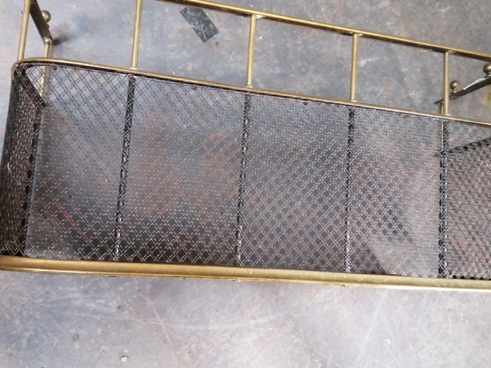 An attractive brass and mesh spark fender. View XII