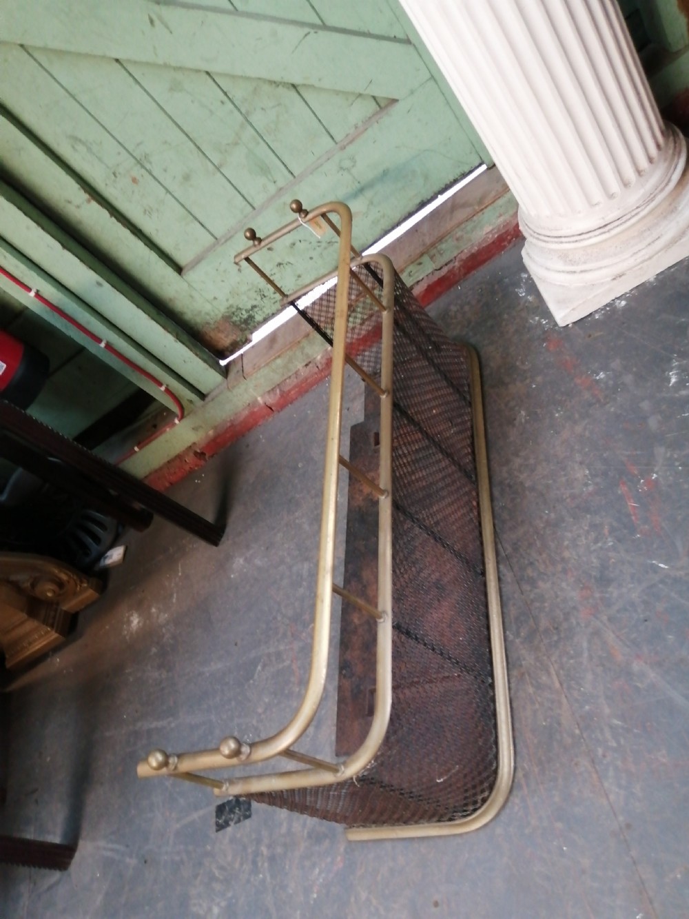 An attractive brass and mesh spark fender. View XIII