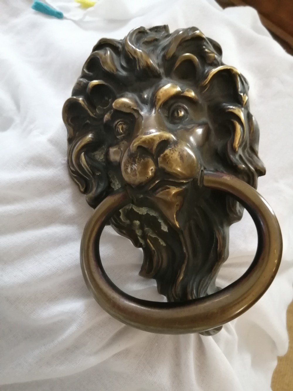 Antique bronze lion head door knocker.