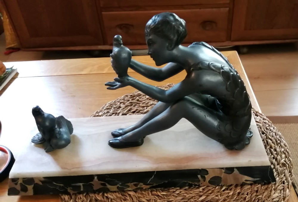 French art deco marble, OnYx and cold painted spelter figure of girl with doves 