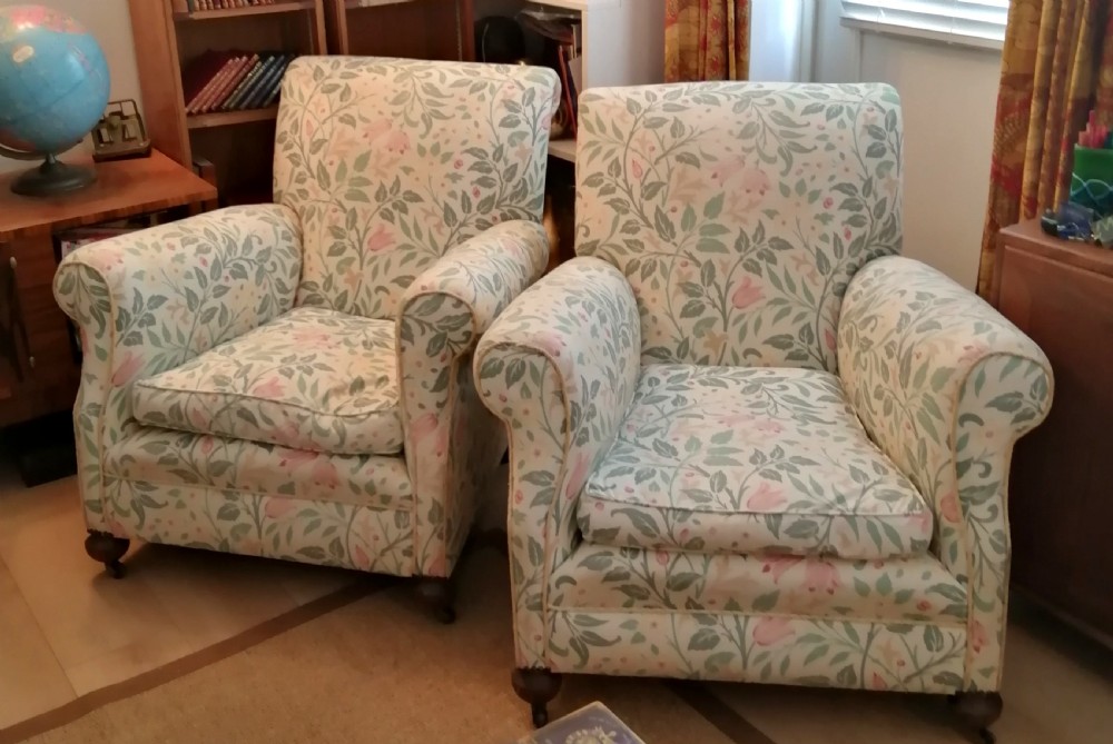 A pair of Antique VICTORIAN upholstered arm chairs.