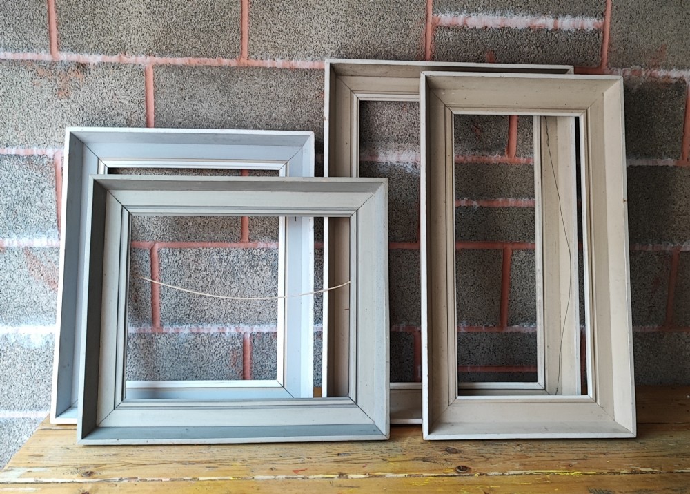 4 large antique painted frames.